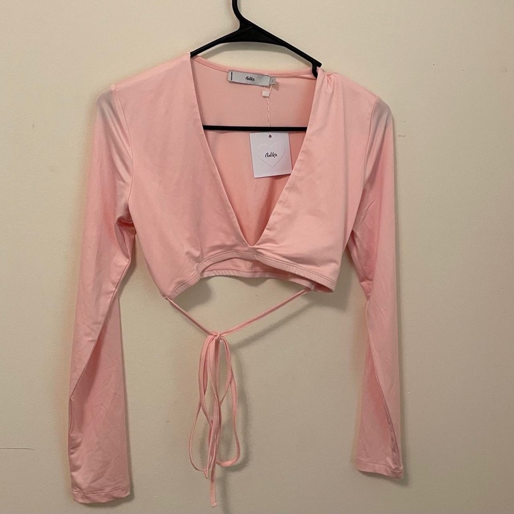 Pink Wrap Crop Top
Adika
Large